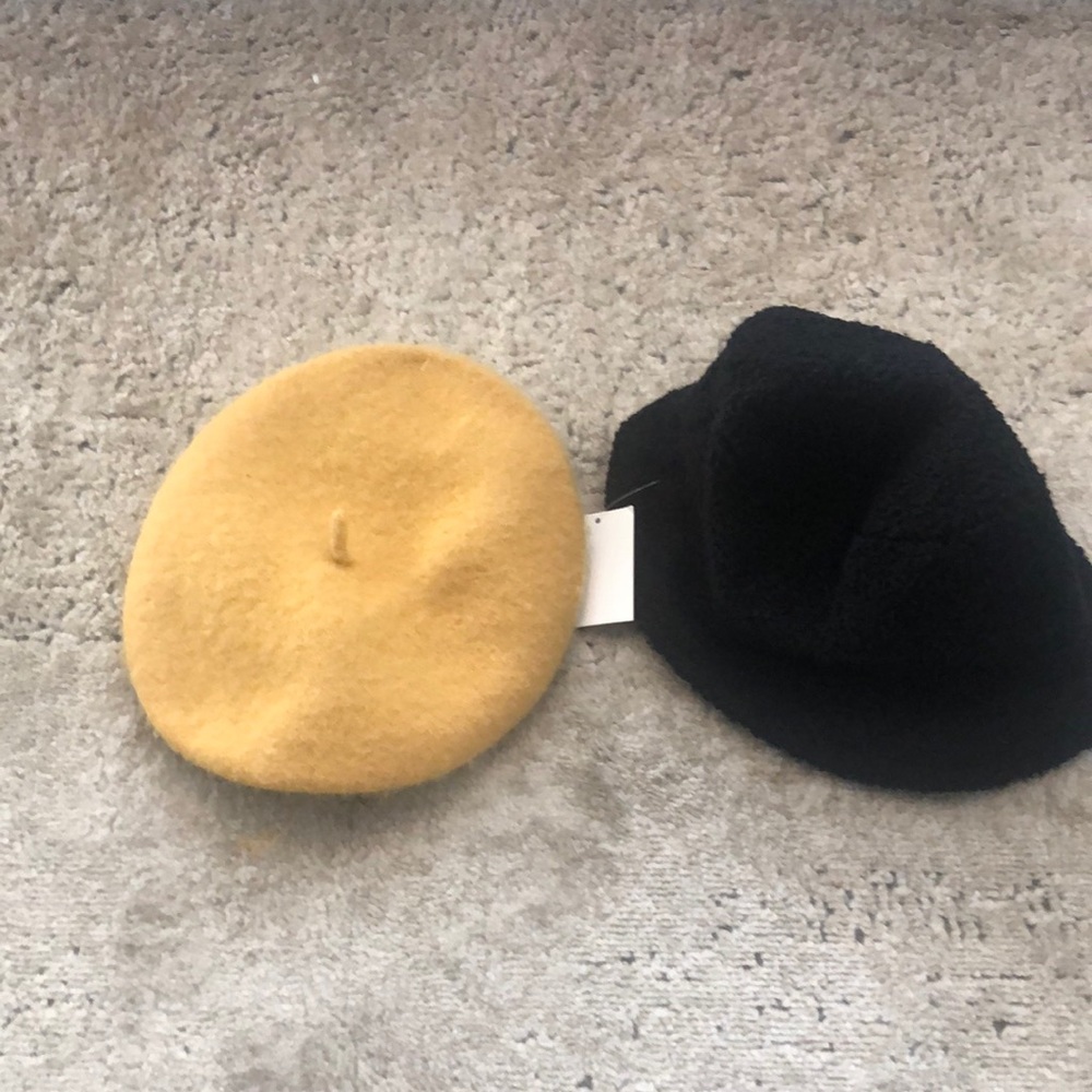 2 new with tags hats one bucket hat and one berat hat